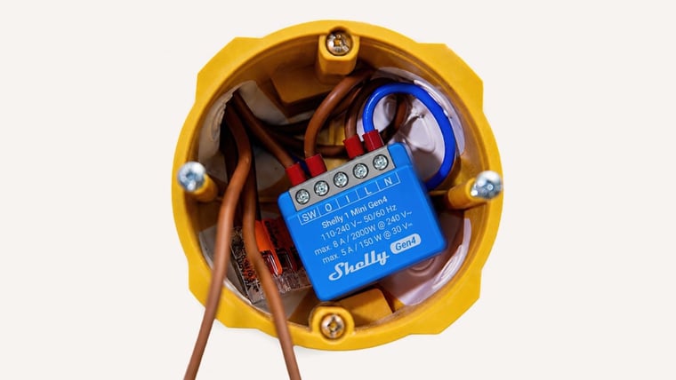 Shelly 1 Mini Gen4 Smart Relay wired into a wall box