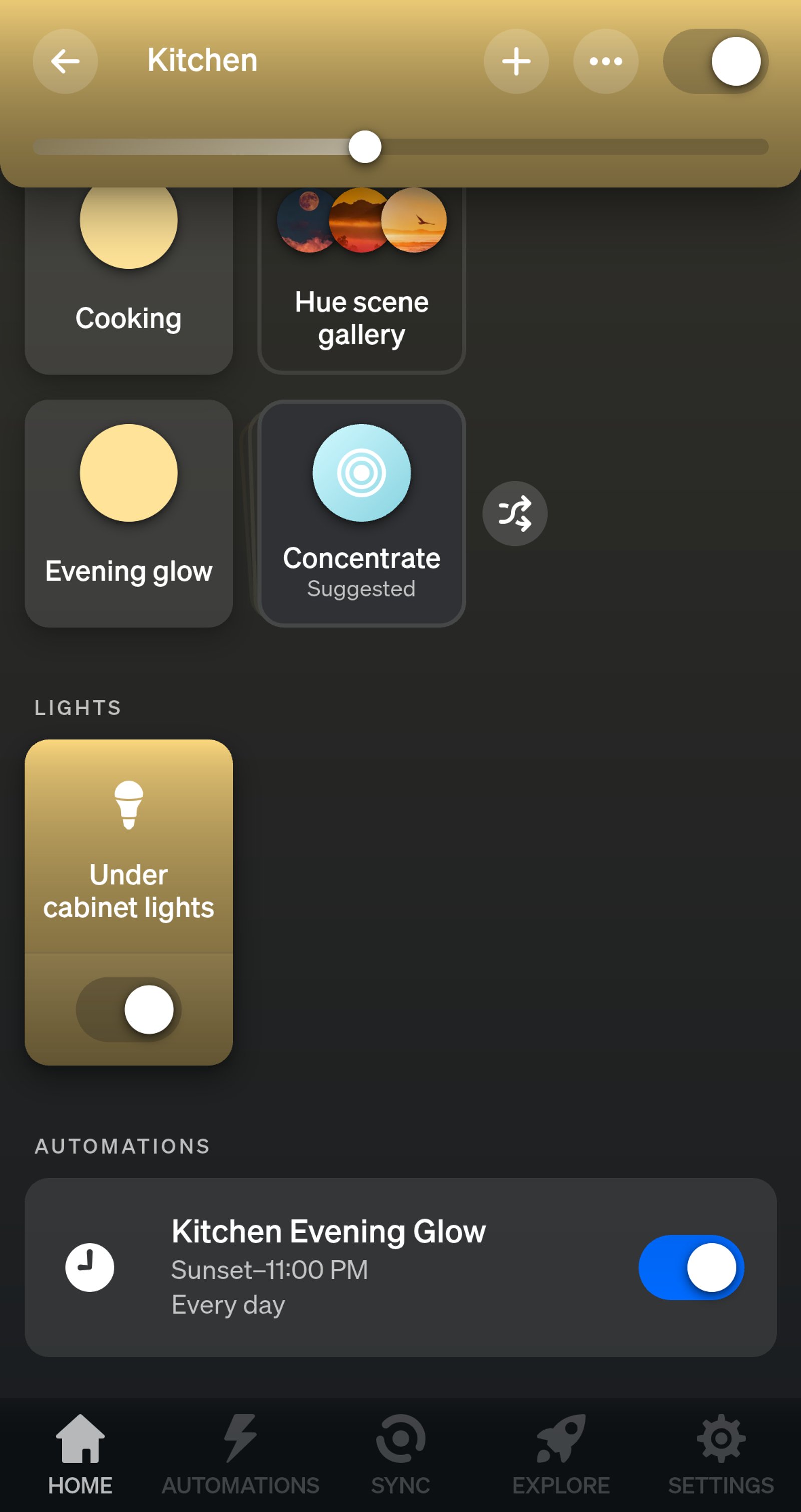 Philips Hue app Kitchen room page with a light named Under cabinet lights and the Kitchen Evening Glow automation, Sunset to 11:00 PM every day.