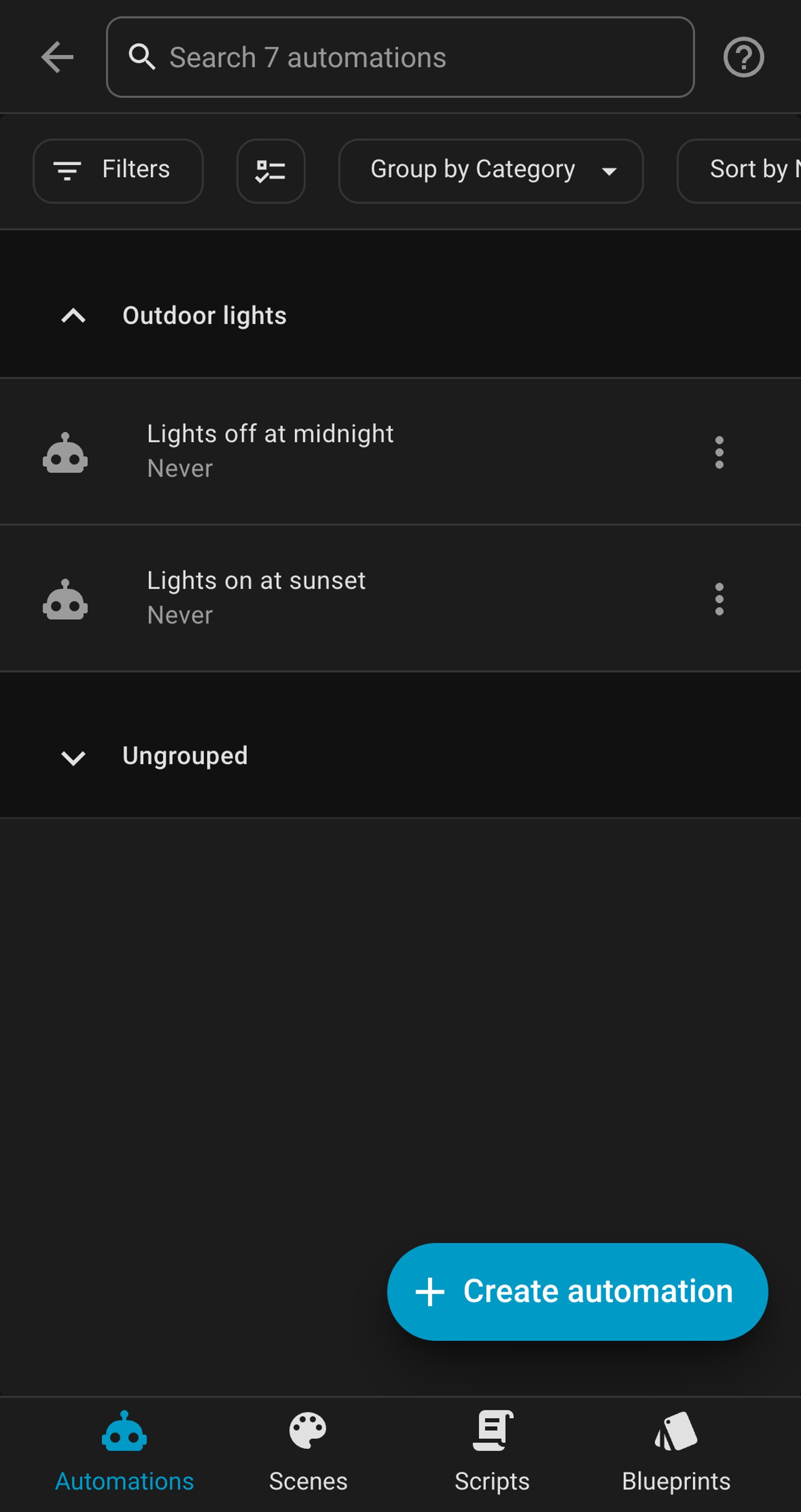 Home Assistant automations list showing Lights off at midnight and Lights on at sunset.