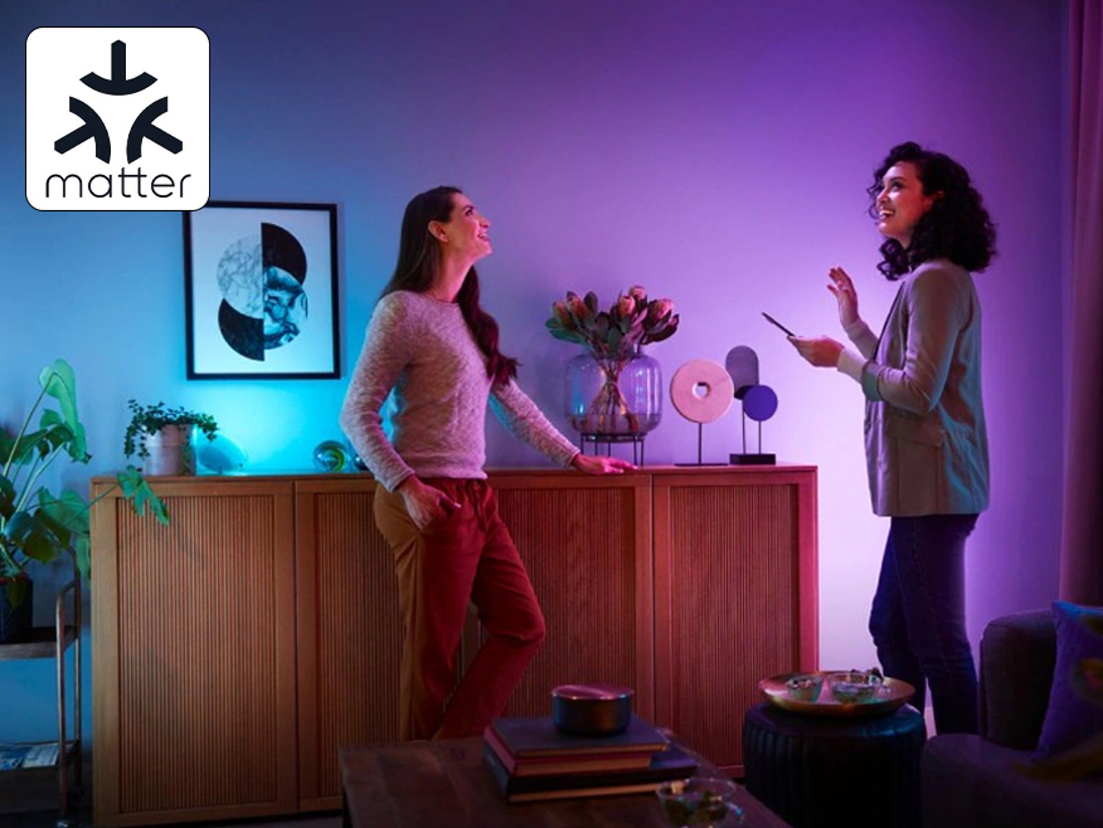 Hue colour lighting in a living room, with the Matter logo