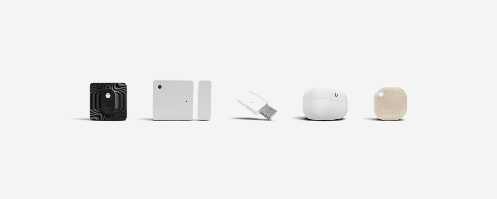 Five Shelly BLU devices in a row: the H&T ZB, Door/Window ZB, BLU Gateway, BLU Motion and BLU Button Tough 1.